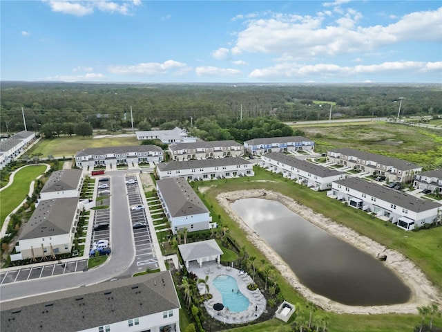 9064 Driven Snow St, Sarasota, FL 34241 - aerial view of a large body of water, a pool, and a heavily wooded area