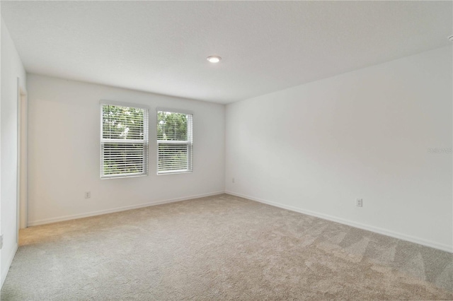 9064 Driven Snow St, Sarasota, FL 34241 - unfurnished room featuring carpet floors and baseboards