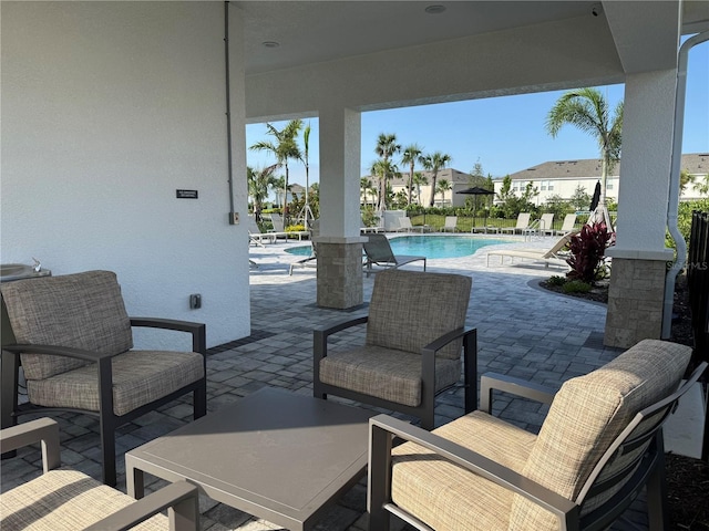 9064 Driven Snow St, Sarasota, FL 34241 - view of patio featuring a community pool and a residential view