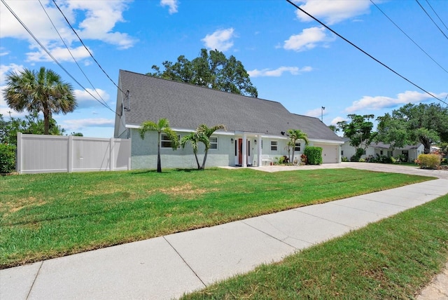 4708 26th Ave W, Bradenton, FL 34209 - cape cod-style house featuring concrete driveway, a garage, stucco siding, and roof with shingles