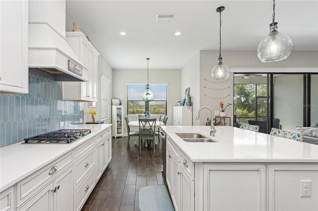 13708 Old Creek Ct, Parrish, FL 34219 - kitchen featuring a sink, stainless steel appliances, light countertops, dark wood finished floors, and recessed lighting