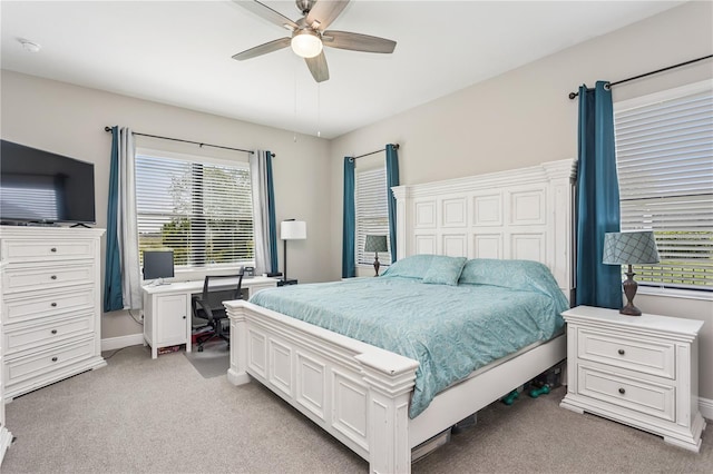 13708 Old Creek Ct, Parrish, FL 34219 - bedroom with light carpet, a ceiling fan, an office area, and baseboards