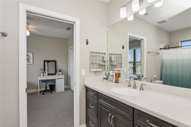 13708 Old Creek Ct, Parrish, FL 34219 - full bathroom featuring vanity, curtained shower, and baseboards