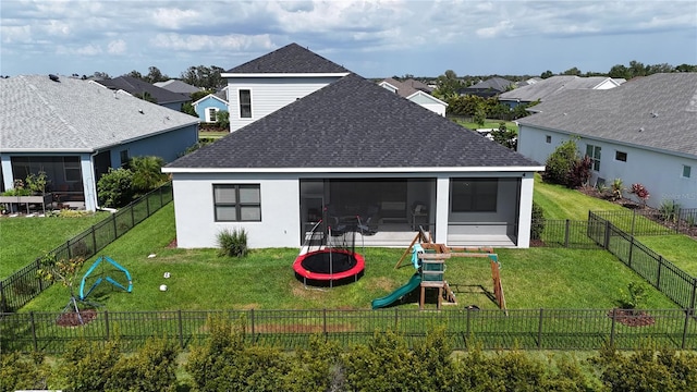 13708 Old Creek Ct, Parrish, FL 34219 - rear view of house featuring a sunroom, a shingled roof, a residential view, and a playground