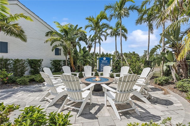 13708 Old Creek Ct, Parrish, FL 34219 - view of patio / terrace featuring a fire pit