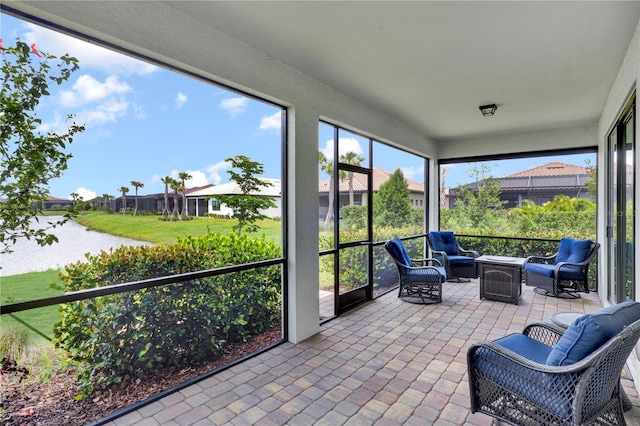 17725 Northwood Pl, Bradenton, FL 34202 - sunroom / solarium with a water view and an outdoor hangout area