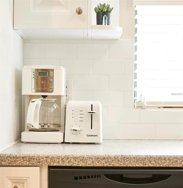 6157 Midnight Pass Rd Unit E73, Sarasota, FL 34242 - kitchen view of decorative backsplash and light countertops