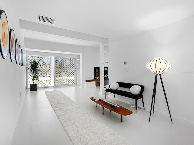 7647 Sanderling Rd, Sarasota, FL 34242 - sitting room featuring baseboards