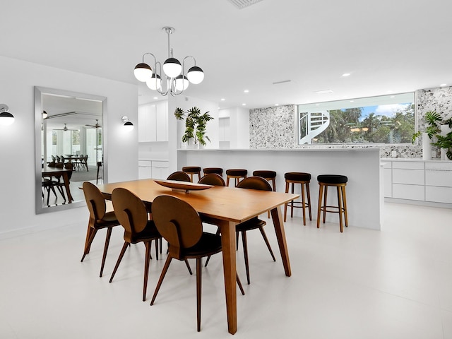 7647 Sanderling Rd, Sarasota, FL 34242 - dining room with healthy amount of natural light and recessed lighting