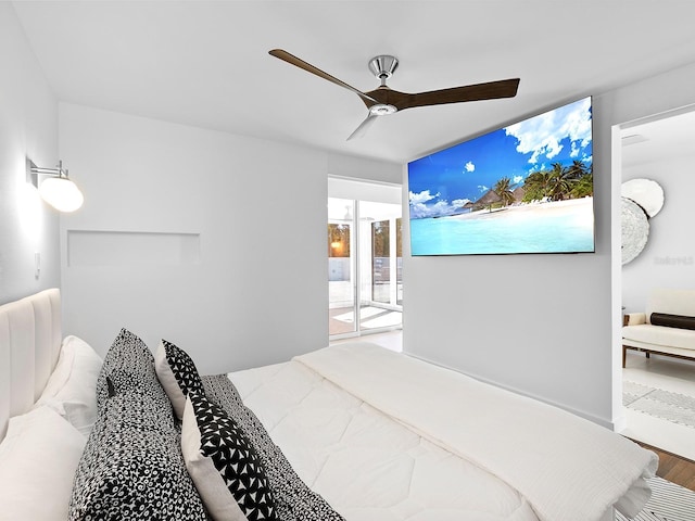 7647 Sanderling Rd, Sarasota, FL 34242 - bedroom featuring wood finished floors, ceiling fan, and ensuite bath