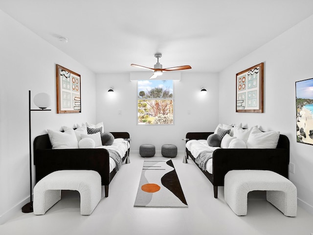 7647 Sanderling Rd, Sarasota, FL 34242 - living room with a ceiling fan and baseboards