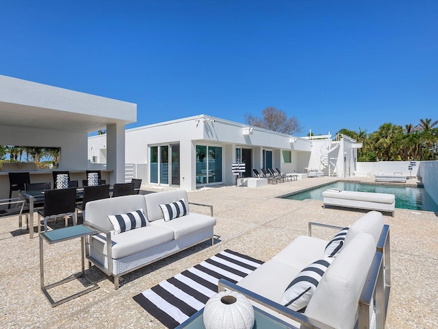 7647 Sanderling Rd, Sarasota, FL 34242 - view of patio / terrace with outdoor lounge area and outdoor dining space