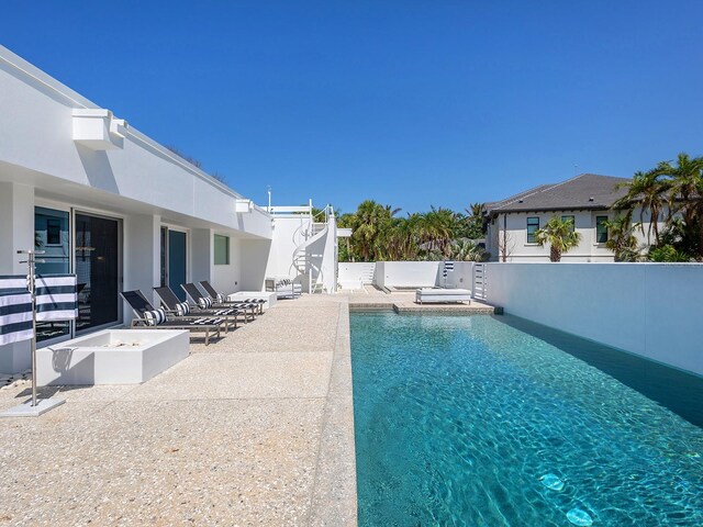 7647 Sanderling Rd, Sarasota, FL 34242 - view of swimming pool with a patio area