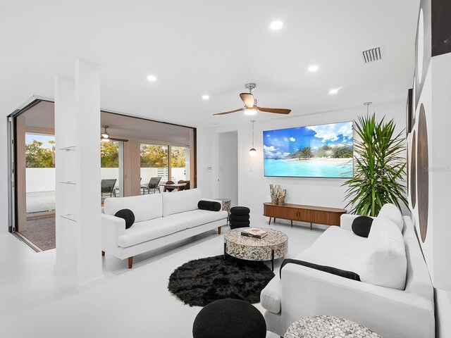 7647 Sanderling Rd, Sarasota, FL 34242 - living room featuring ceiling fan and recessed lighting