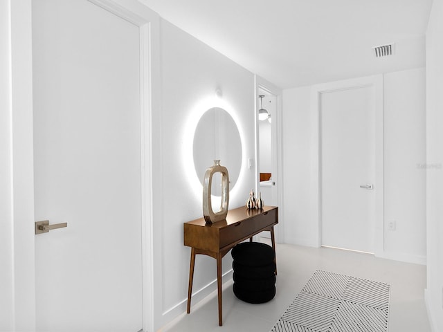7647 Sanderling Rd, Sarasota, FL 34242 - hallway featuring baseboards