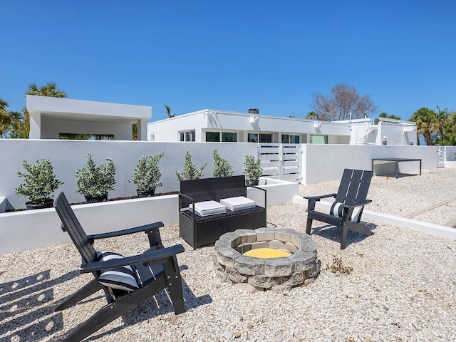 7647 Sanderling Rd, Sarasota, FL 34242 - view of patio / terrace featuring an outdoor fire pit