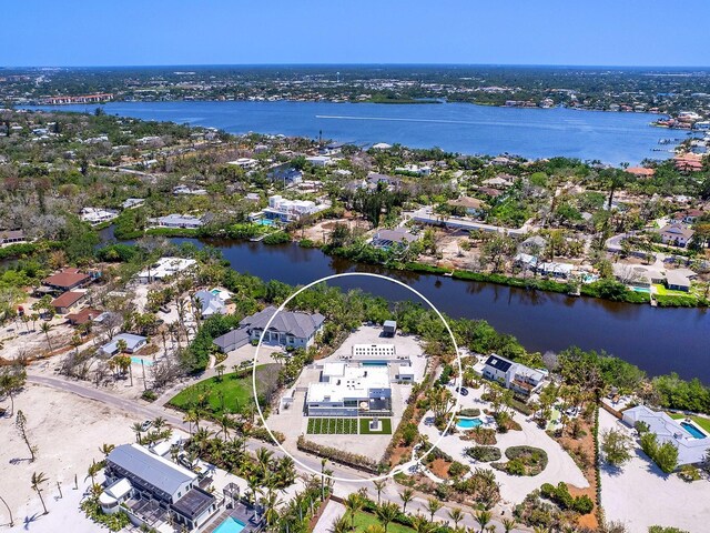 7647 Sanderling Rd, Sarasota, FL 34242 - aerial perspective of suburban area featuring a large body of water