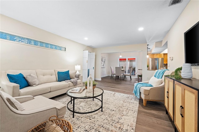 2419 Riverbluff Pkwy Unit V233, Sarasota, FL 34231 - living area with wood finished floors and recessed lighting