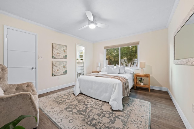2419 Riverbluff Pkwy Unit V233, Sarasota, FL 34231 - bedroom featuring ornamental molding, wood finished floors, baseboards, and ceiling fan