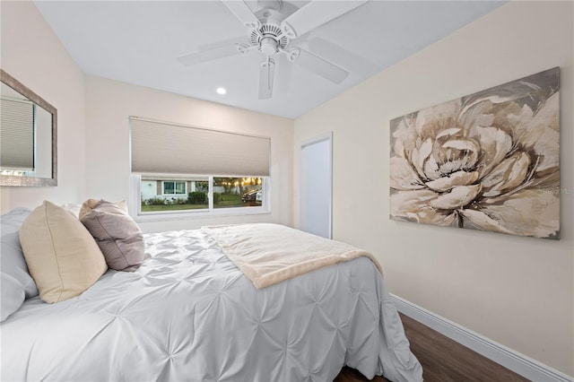 2419 Riverbluff Pkwy Unit V233, Sarasota, FL 34231 - bedroom featuring wood finished floors, baseboards, recessed lighting, and a ceiling fan