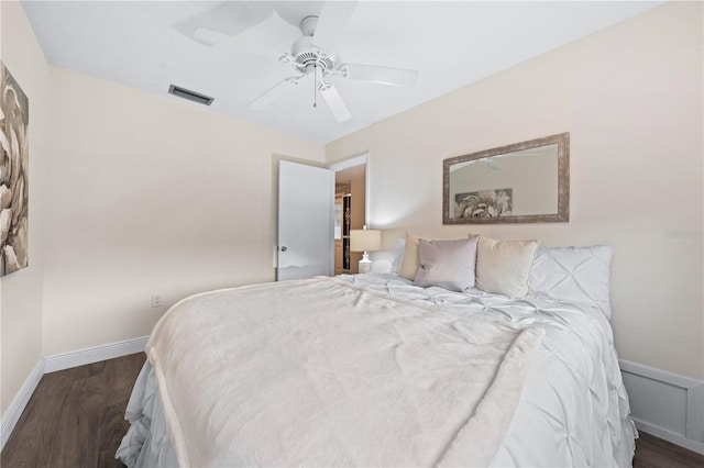 2419 Riverbluff Pkwy Unit V233, Sarasota, FL 34231 - bedroom with wood finished floors, baseboards, and a ceiling fan