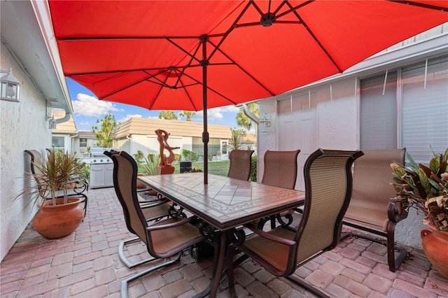 2419 Riverbluff Pkwy Unit V233, Sarasota, FL 34231 - view of patio featuring outdoor dining space