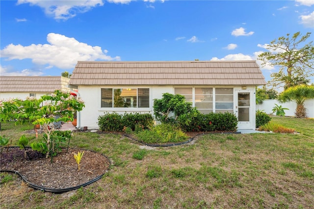 2419 Riverbluff Pkwy Unit V233, Sarasota, FL 34231 - view of front of property featuring mansard roof and stucco siding