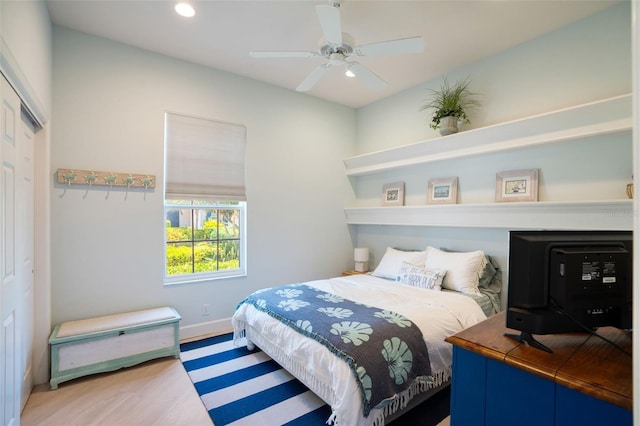 7164 Rue De Palisades Unit 5, Sarasota, FL 34238 - bedroom featuring baseboards, recessed lighting, wood finished floors, a closet, and a ceiling fan