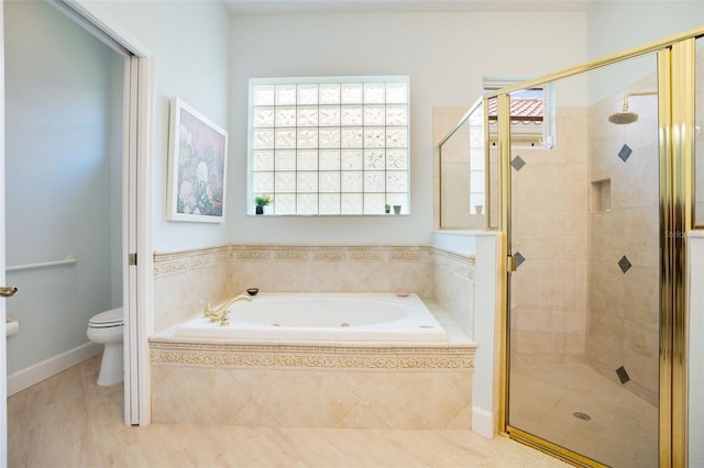 7164 Rue De Palisades Unit 5, Sarasota, FL 34238 - bathroom with a bath, a stall shower, toilet, and tile patterned flooring
