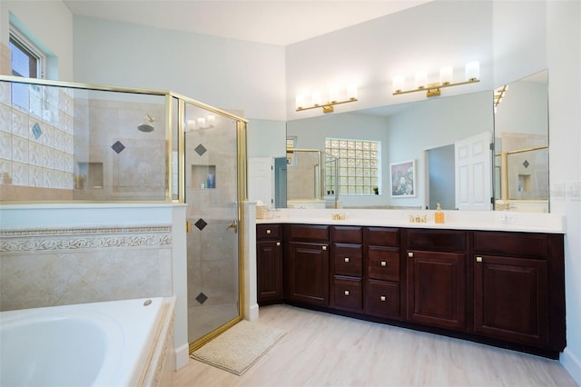 7164 Rue De Palisades Unit 5, Sarasota, FL 34238 - full bathroom with a shower stall, a bath, and double vanity