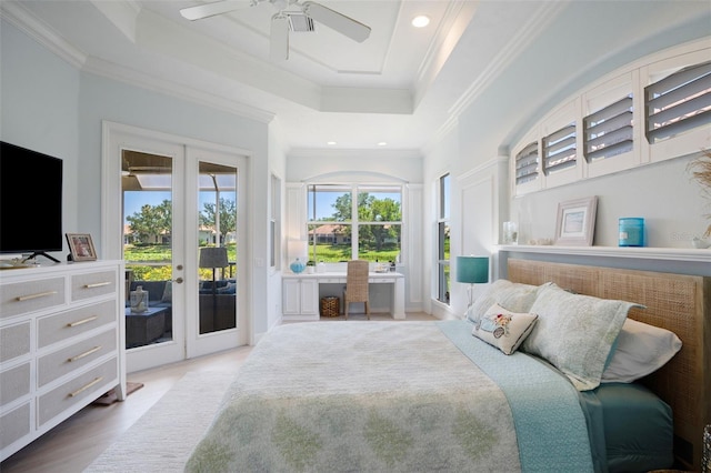 7164 Rue De Palisades Unit 5, Sarasota, FL 34238 - bedroom with french doors, access to outside, a raised ceiling, ornamental molding, and a ceiling fan