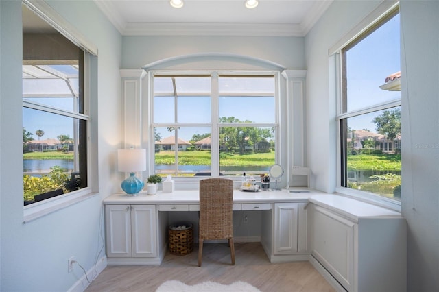 7164 Rue De Palisades Unit 5, Sarasota, FL 34238 - office area with built in study area, light wood finished floors, crown molding, and a water view