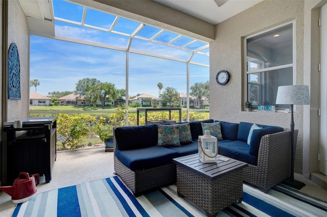 7164 Rue De Palisades Unit 5, Sarasota, FL 34238 - view of patio / terrace featuring outdoor lounge area, a lanai, and a residential view