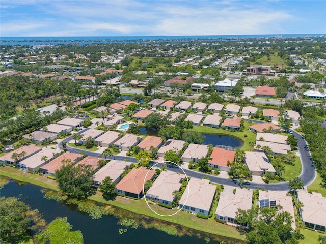 7164 Rue De Palisades Unit 5, Sarasota, FL 34238 - aerial view of property and surrounding area featuring a nearby body of water and nearby suburban area