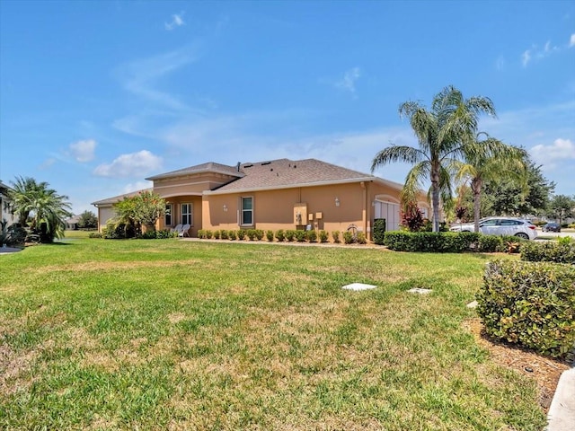 635 Chipper Dr, Sun City Center, FL 33573 - view of front facade with a front yard and stucco siding