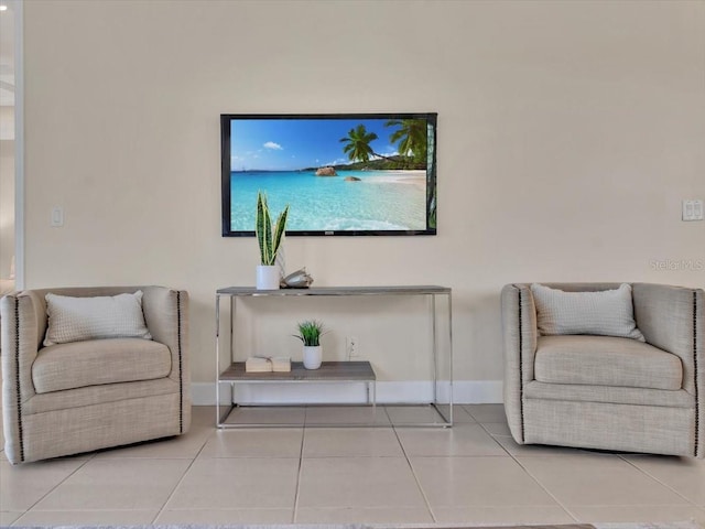 635 Chipper Dr, Sun City Center, FL 33573 - sitting room featuring tile patterned floors and baseboards