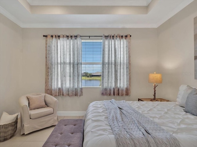 635 Chipper Dr, Sun City Center, FL 33573 - tiled bedroom with a tray ceiling and crown molding