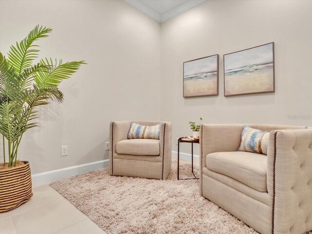 635 Chipper Dr, Sun City Center, FL 33573 - living area with baseboards, crown molding, and tile patterned floors