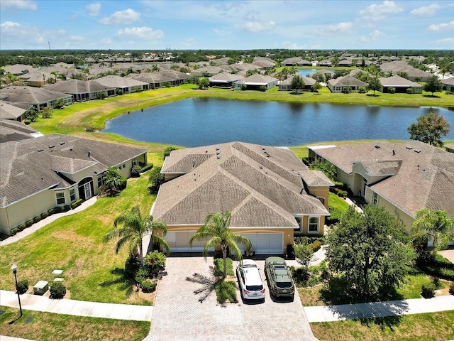 635 Chipper Dr, Sun City Center, FL 33573 - aerial view of residential area with a nearby body of water