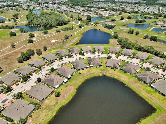635 Chipper Dr, Sun City Center, FL 33573 - aerial overview of property's location featuring nearby suburban area and a nearby body of water