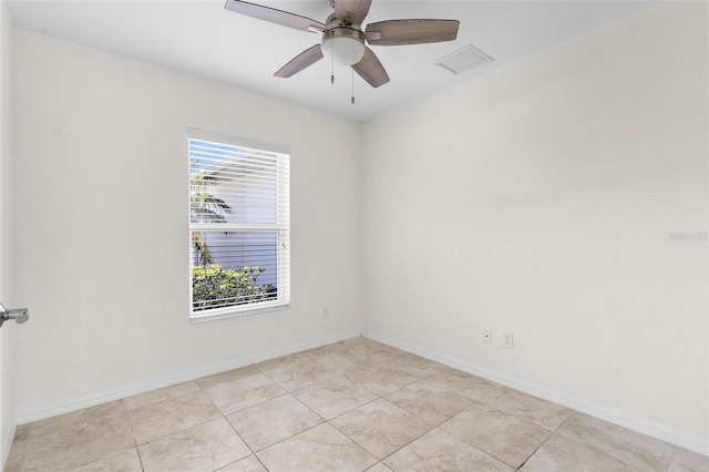 2575 Johannesberg Rd, North Port, FL 34288 - empty room with healthy amount of natural light, a ceiling fan, and baseboards