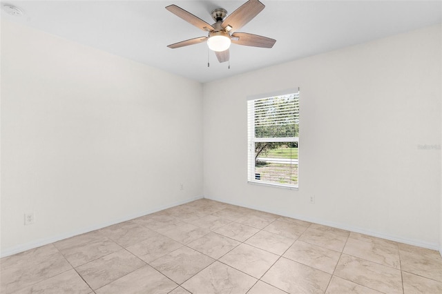 2575 Johannesberg Rd, North Port, FL 34288 - empty room with a ceiling fan, baseboards, and a smoke detector