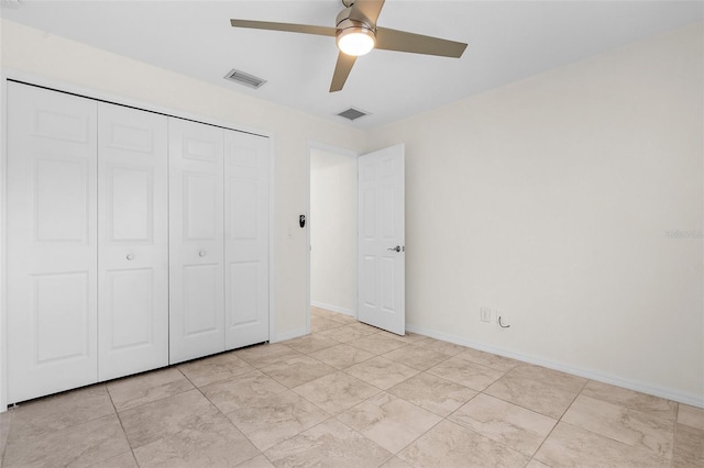 2575 Johannesberg Rd, North Port, FL 34288 - unfurnished bedroom featuring a closet, baseboards, and ceiling fan
