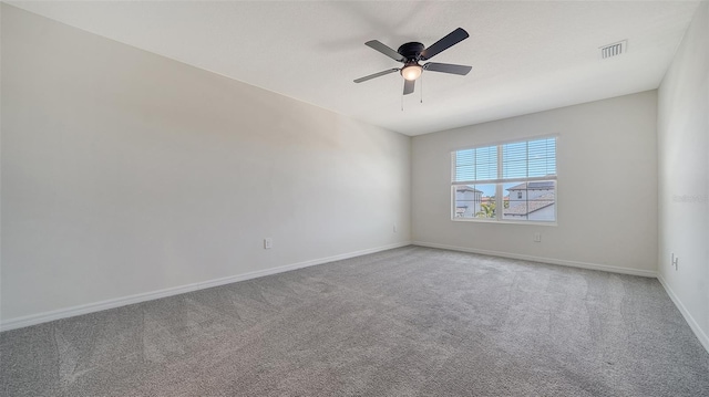 12728 Lateral Root Dr, Sarasota, FL 34238 - carpeted spare room with baseboards and a ceiling fan