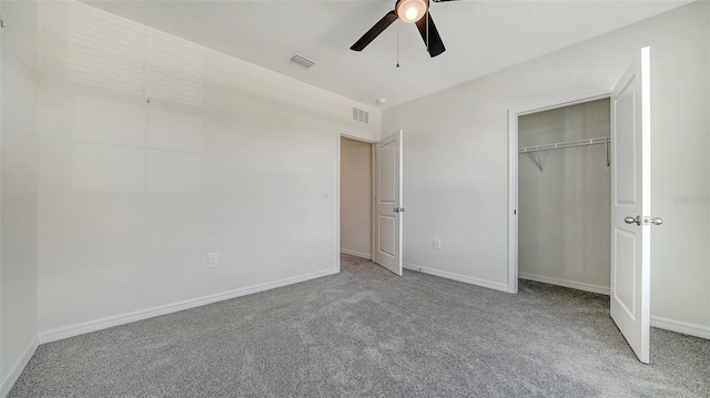 12728 Lateral Root Dr, Sarasota, FL 34238 - unfurnished bedroom featuring carpet flooring, baseboards, a ceiling fan, and a closet