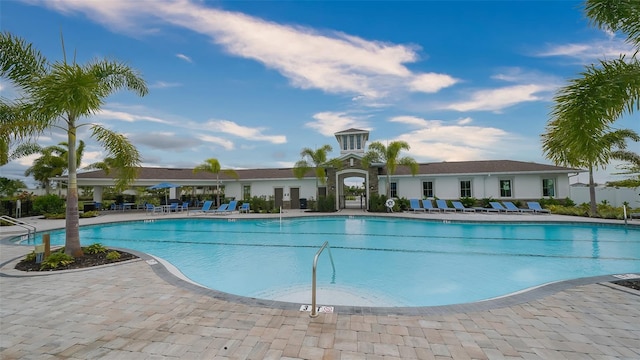12728 Lateral Root Dr, Sarasota, FL 34238 - community pool with a patio