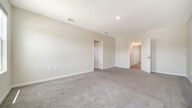 12732 Lateral Root Dr, Sarasota, FL 34238 - carpeted spare room with baseboards
