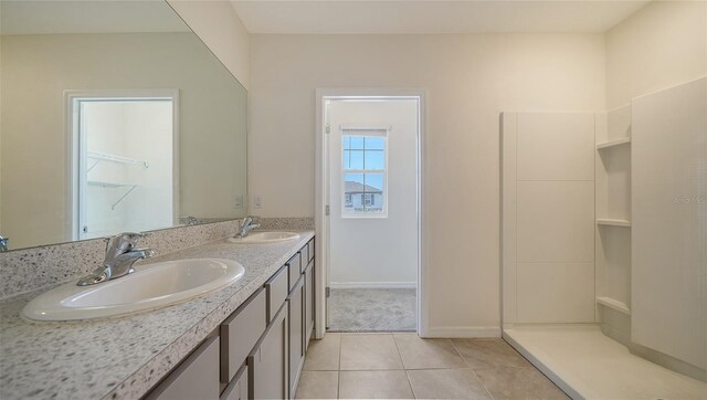 12732 Lateral Root Dr, Sarasota, FL 34238 - bathroom featuring double vanity and tile patterned flooring