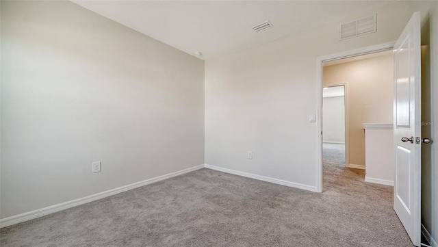 12732 Lateral Root Dr, Sarasota, FL 34238 - empty room with carpet flooring and baseboards
