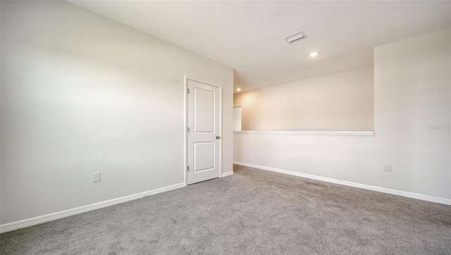 12732 Lateral Root Dr, Sarasota, FL 34238 - carpeted empty room with baseboards and recessed lighting